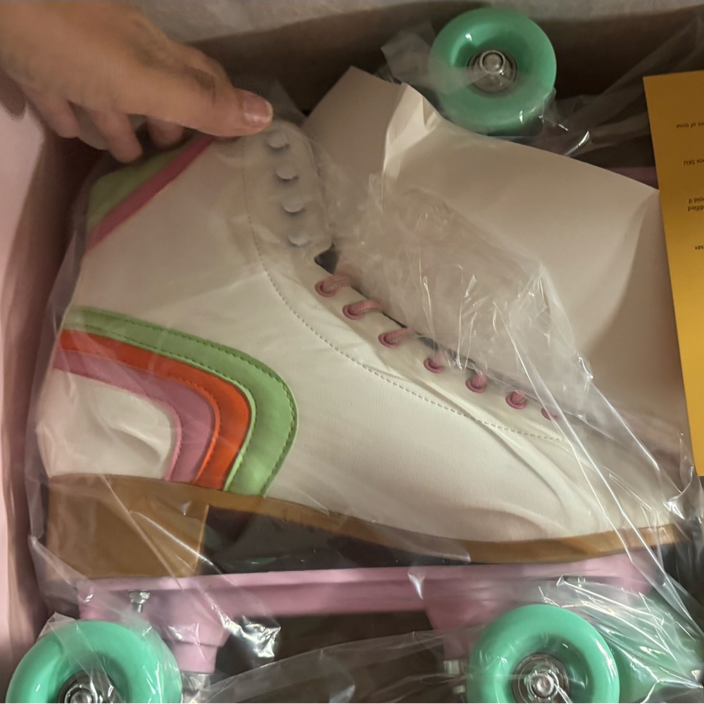 New cosmic skates women’s size 11 White Roller Skates with Green & Pink Accents